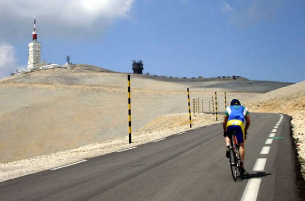 Grinding past Tom Simpson's resting spot. Photo copyright Roadcycling.com.
