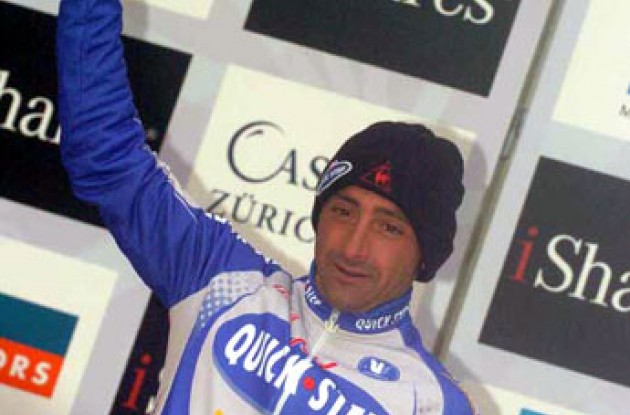 Bettini on the podium. Photo copyright Fotoreporter Sirotti.