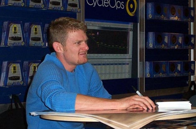 Next please...Floyd Landis was in demand. Photo copyright Roadcycling.com.