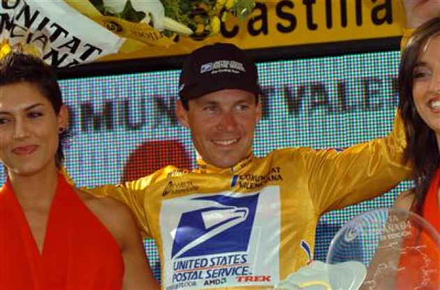 Max van Heeswijk on the podium in the golden leader's jersey.