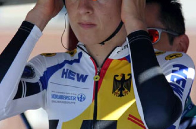 Arndt adjusts her helmet seconds before take off. Photo copyright Paul Sampara Photographics.