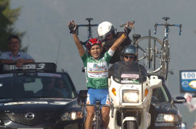 José Rujano takes a stage win in the Tour of Italy. Photo copyright Fotoreporter Sirotti.