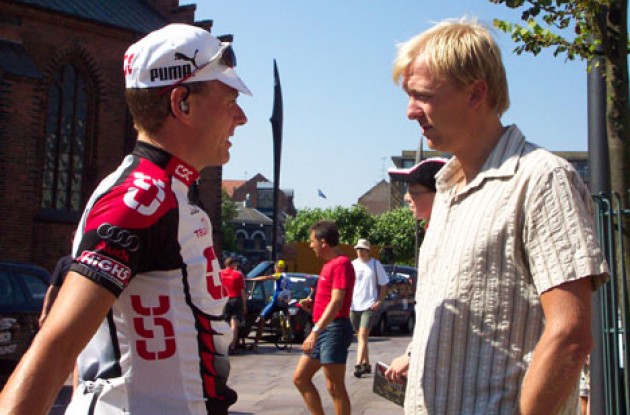 Team CSC's Michael Sandstød talks with team mate "Mr. Attack" Jakob Piil. Hey Jakob...let's have a barbecue one of these days... Photo copyright Roadcycling.com.