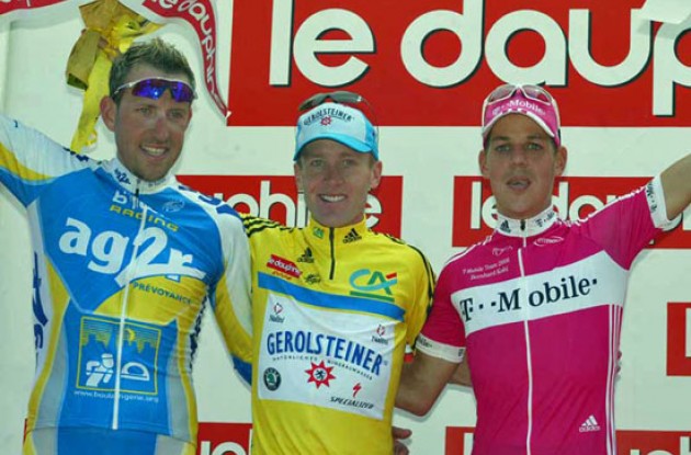 The overall top 3 on the podium in Grenoble. Levi Leipheimer, Moreau, and Kohl. Photo copyright Fotoreporter Sirotti.