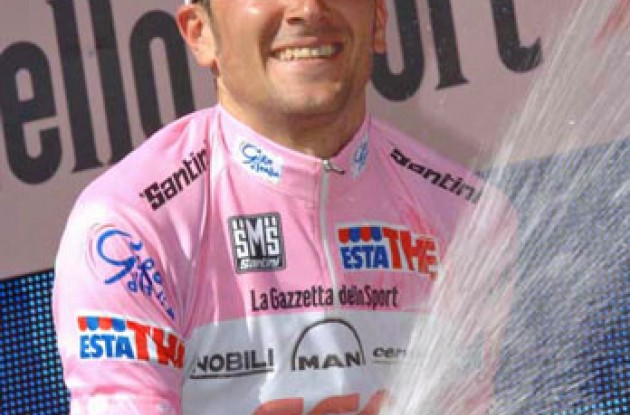 Ivan Basso on the podium. Photo copyright Fotoreporter Sirotti.