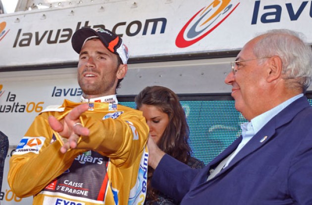 Valverde gets to put on the golden jersey. Photo copyright Roadcycling.com.