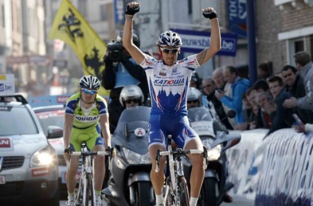 Pozzato takes the stage win.