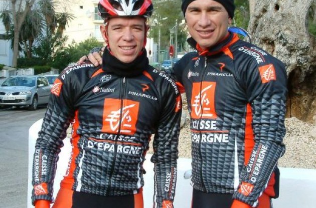 Uran and Perez pose in front of the camera.