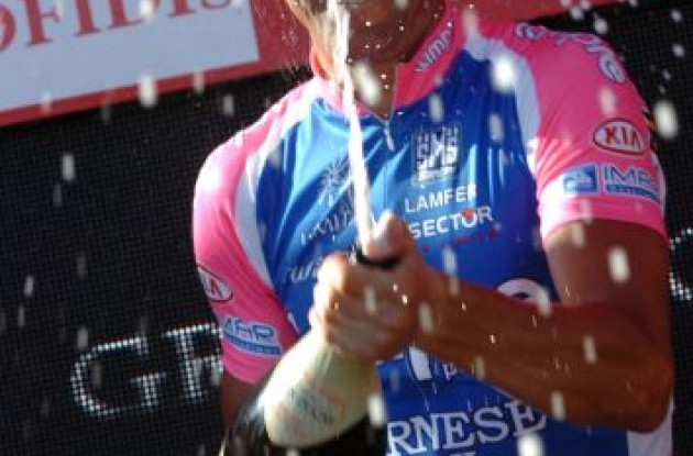 Alessandro Petacchi celebrating his Vuelta stage win on the podium. Photo copyright Fotoreporter Sirotti.