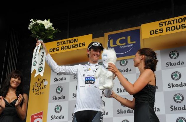 Young podium girls up for grabs for the young rider classification leader Andy Schleck. Photo copyright Fotoreporter Sirotti.