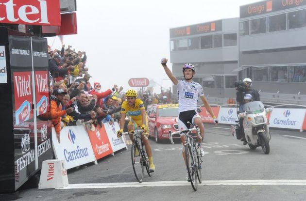 Andy Schleck crosses the finish line first. Photo copyright Fotoreporter Sirotti.