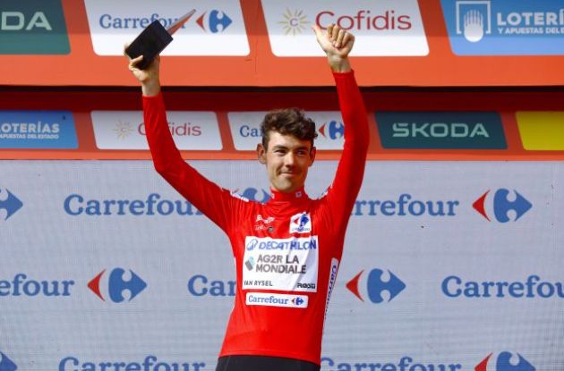 Ben O'Connor on the podium in the red jersey