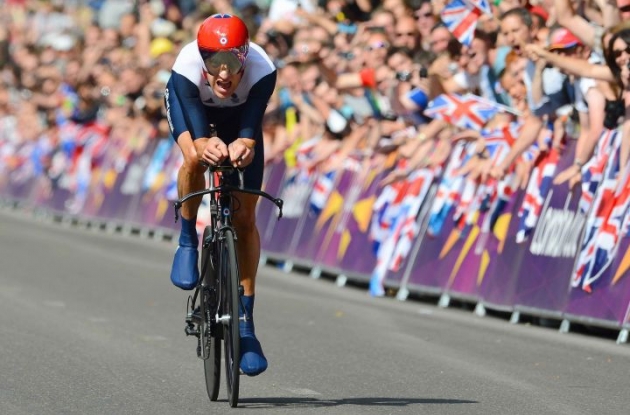 Great Britain's Tour de France Champion Bradley Wiggins wins Olympic gold medal in the men's individual time trial in London ahead of Germany's Tony Martin and Great Britain's Christopher Froome. Photo copyright Tim de Waele.