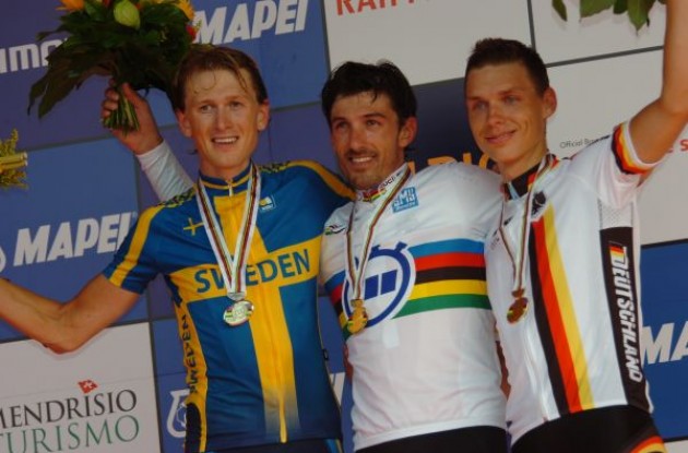 Fabian Cancellara, Gustav Erik Larsson, and Tony Martin on the podium in Switzerland. Photo copyright Fotoreporter Sirotti.