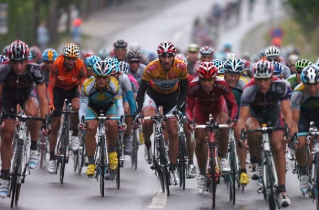 Cancellara, Horner and Vinokourov in the rainy stage 4 of the 2009 Vuelta a Espana. Photo copyright Fotoreporter Sirotti.