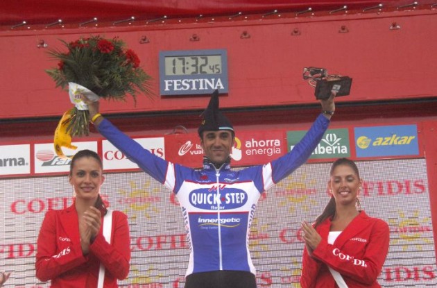 A proud and moved Carlos Barredo on the podium celebrating his Tour of Spain stage win. Photo copyright Fotoreporter Sirotti.