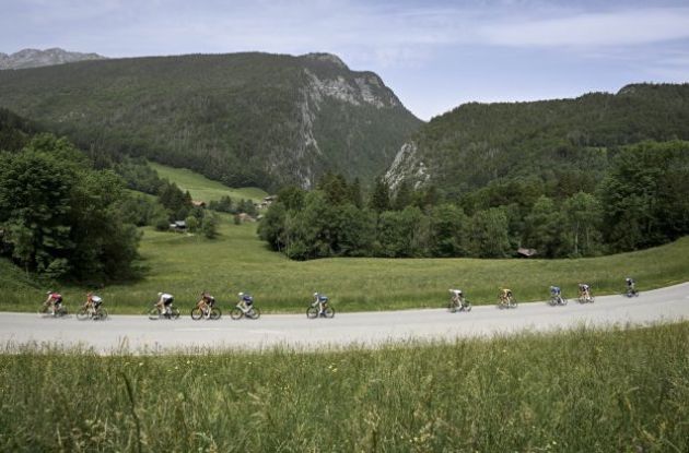 Cyclists passing French mountains