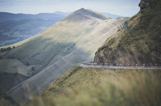 Cyclists and mountain peaks