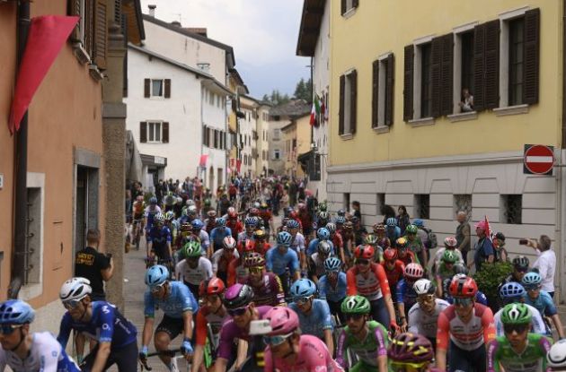 Giro d'Italia peloton passes through Italian village during stage 17