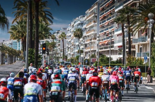 Cyclists riding through Nice in stage 8 of Paris-Nice