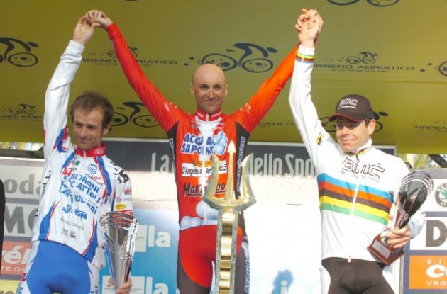 Stefano Garzelli, Michele Scarponi and Cadel Evans on the podium. Photo copyright Fotoreporter Sirotti.