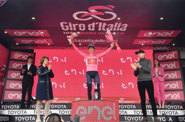 geraint Thomas celebrates his Giro d'Italia lead on the podium