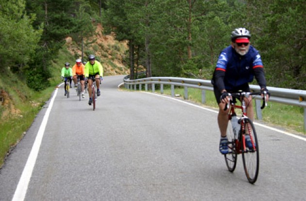 Fifty nine year old Don Anderson leads bunch up a long climb in Pyrenees. Photo by Thomson Bike Tours.