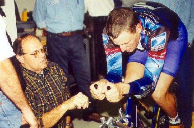 John Cobb working with Lance Armstrong on his time trial position.