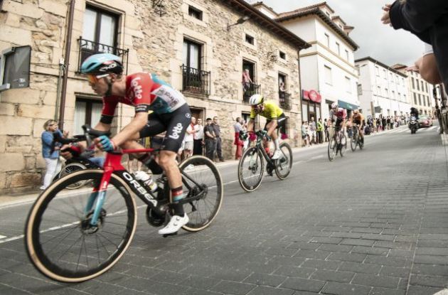 La Vuelta cyclists passing through Spanish village