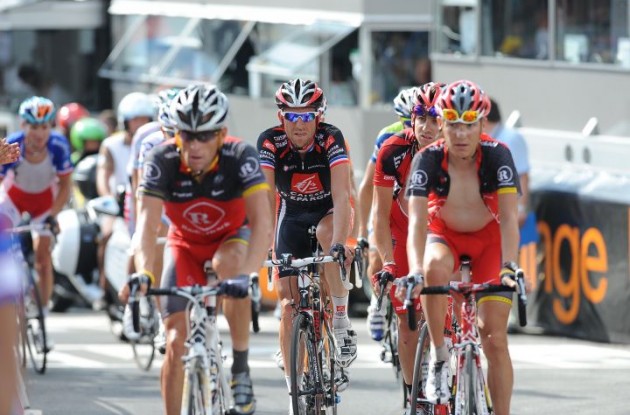 Team RadioShack's Janez Brajkovic pulls Lance Armstrong across the finish line. Photo copyright Fotoreporter Sirotti.