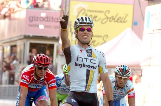 Mark Cavendish powers to his 4th stage win in this year's Tour de France. Photo copyright Fotoreporter Sirotti.