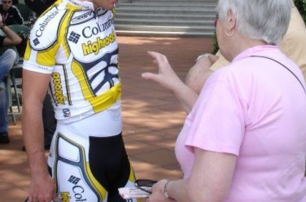 Mark Cavendish listens to British granny give him advise just before he starts time trial warm-up. Photo by Andrew Ward.