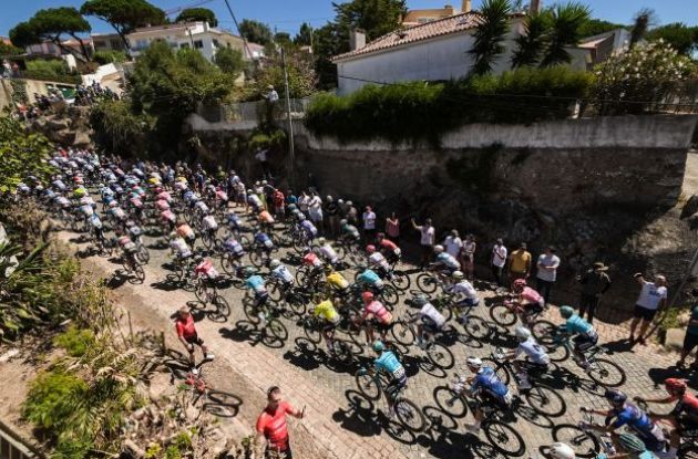 La Vuelta peloton climbing Portuguese hills