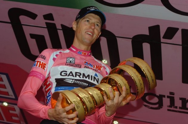 Team Garmin-Barracuda's Ryder Hesjedal wins Giro d'Italia 2012. Ryder on the podium in Milan with the Giro d'Italia trophy. Photo Fotoreporter Sirotti.