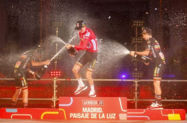 Sepp Kuss celebrates La Vuelta 2023 victory with champagne on podium