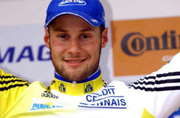 Boonen is still wearing the yellow and white leader's jersey. Photo copyright Fotoreporter Sirotti.