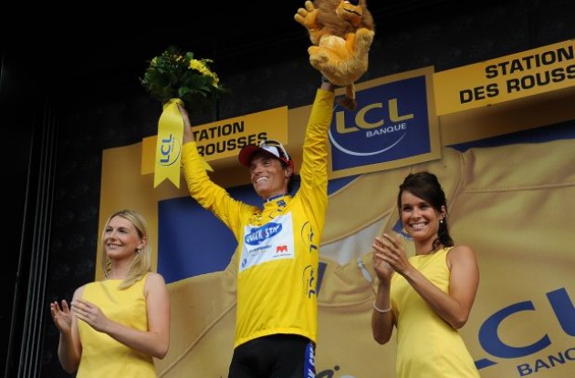 Sylvain Chavanel leads the Tour de France overall..so he gets some quality time with the podium girls. Photo copyright Fotoreporter Sirotti.