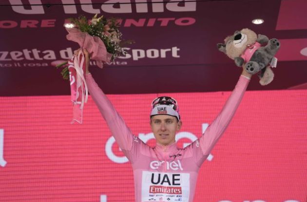 Tadej Pogacar on the podium in the pink jersey as leader of Giro d'Italia 2024