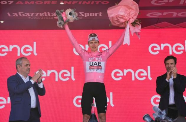 Tadej Pogacar celebrates race lead on Giro d'Italia podium