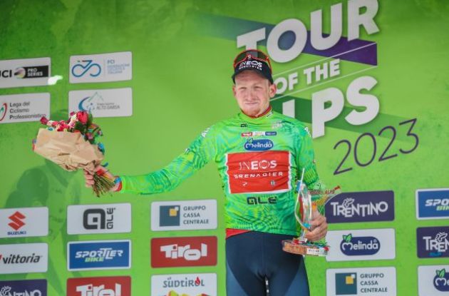 Tao Geoghegan Hart celebrates his victory on the Tour of the Alps podium