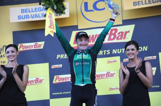 A proud and moved Thomas Voeckler of Team Europcar is celebrated on the podium in France. Photo Fotoreporter Sirotti.