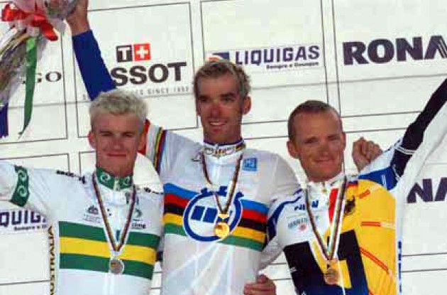 Look who's happy now! Millar and co. on the podium. Photo copyright Fotoreporter Sirotti.