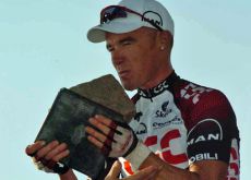 Stuart O'Grady (Team CSC) with the classic cobblestone trophy.