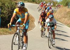 Alberto Contador (Team Astana) after his crash - closely followed by loyal teammate Levi Leipheimer. Alberto Contador (Team Astana) after his crash - closely followed by loyal teammate Levi Leipheimer.