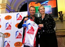 Chris Carmichael presents the 2011 Quiznoz Pro Challenge Race Leader Jersey.