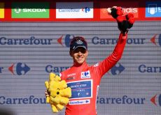 Remco Evenepoel wears the red jersey as leader of La Vuelta 2022