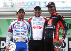 Philippe Gilbert on the 2010 Tour of Lombardy podium with Scarponi and Lastras.