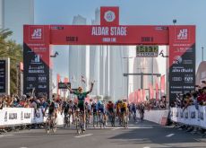 Tim Merlier wins the sprint across the finish line in the 2023 UAE Tour