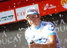 Yauheni Hutarovich celebrates his Vuelta stage win on the podium. Photo copyright Fotoreporter Sirotti.