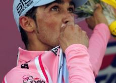 Alberto Contador in the maglia rosa on the podium at the top of Mount Etna. Photo Fotoreporter Sirotti.